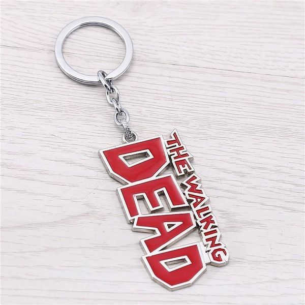 Брелок Ходячі мерці Walking Dead Dog Tag with Crossbow 27.166 27.166 фото